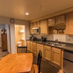 Wild Strawberry Lodge Suites small kitchens include toaster, toaster oven, microwave, stove top and refrigerator