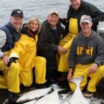 Happy Fishing Crew Pose With Their Sitka Halibut