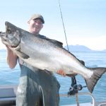 Greg Holding up a Monster King Salmon